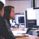 2 woman on laptop