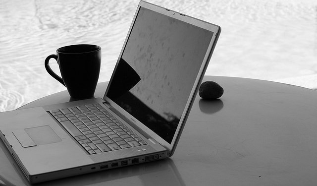 black laptop on desk